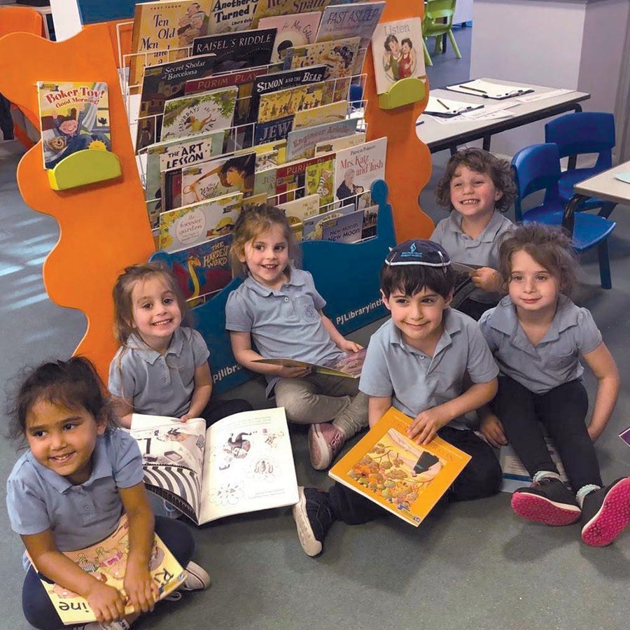 Children reading books together