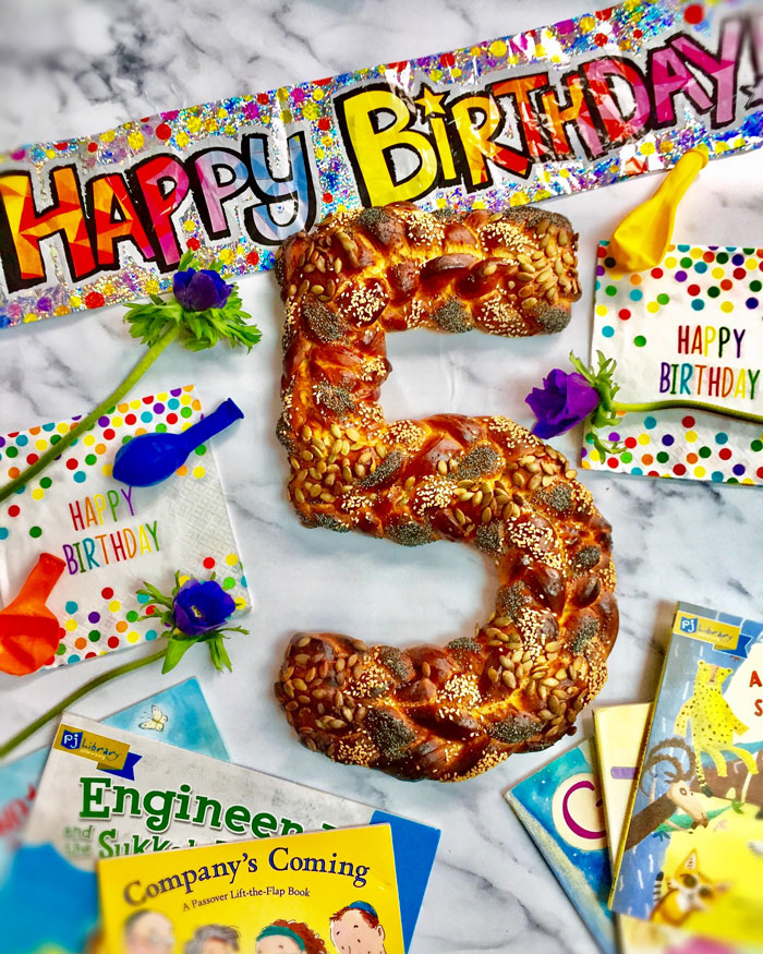 a picture of challah shaped like a five