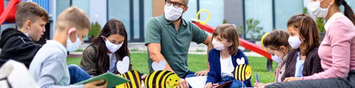 children learning in an outdoor classroom