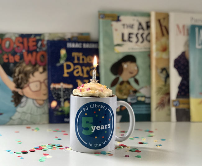 A photo of a Mug cake in a PJ library in the UK 5th birthday mug