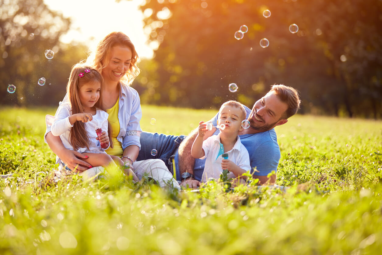 Family Blowing Bubbles